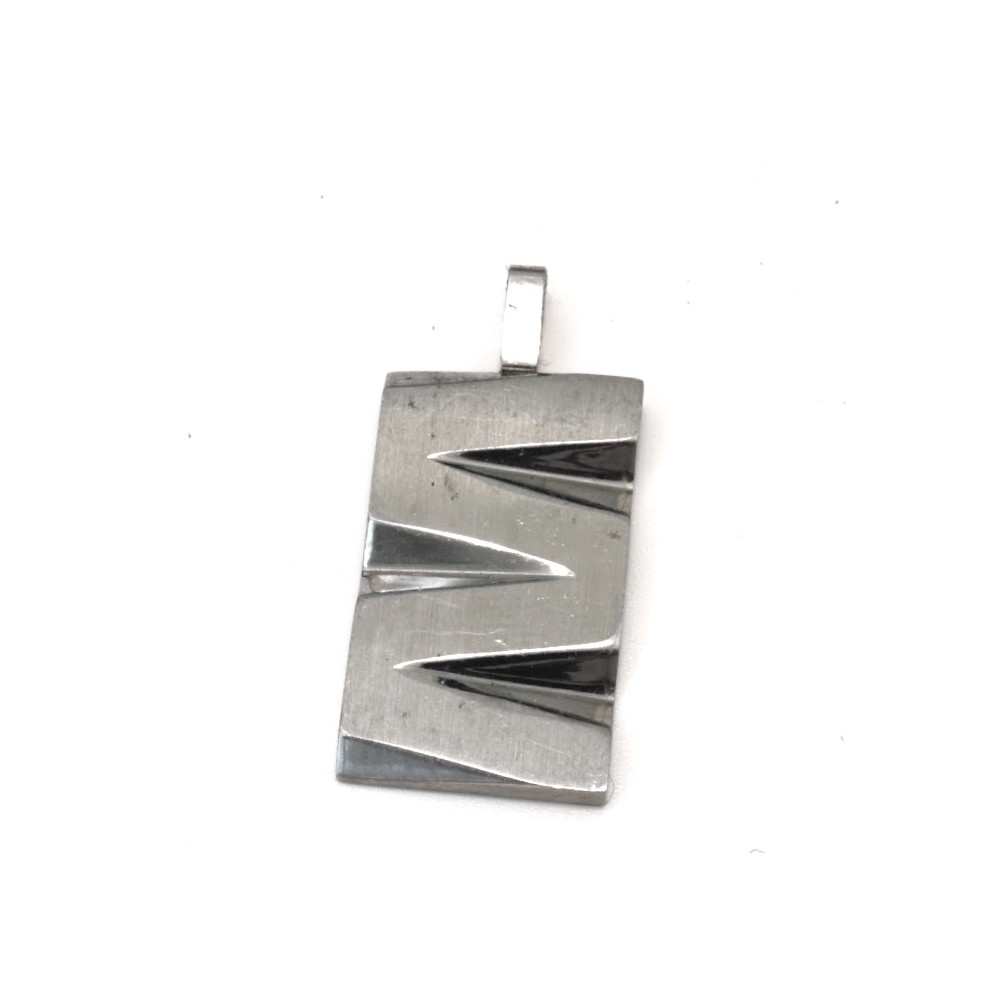 Dije de Acero con relieve 22mm